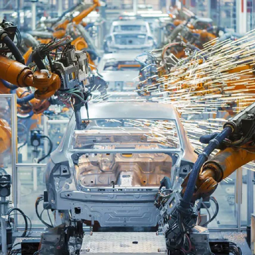Robots working on an assembly line in a car factory