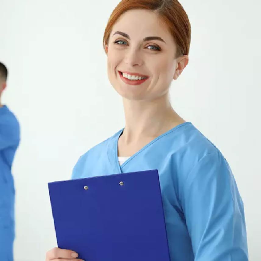 A smiling physical therapist, holding a clipboard